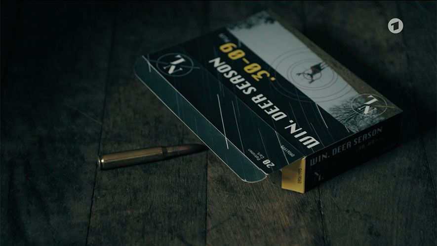 Screenshot from "Tatort Dreams" showing a package for bullet casing